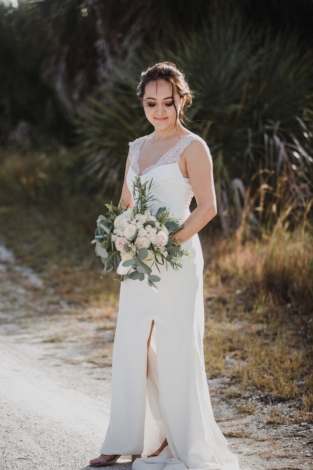 Beautiful Bride on Honeymoon Island for her elopement photographed by Saint Petersburg wedding photographer Tami Keehn.