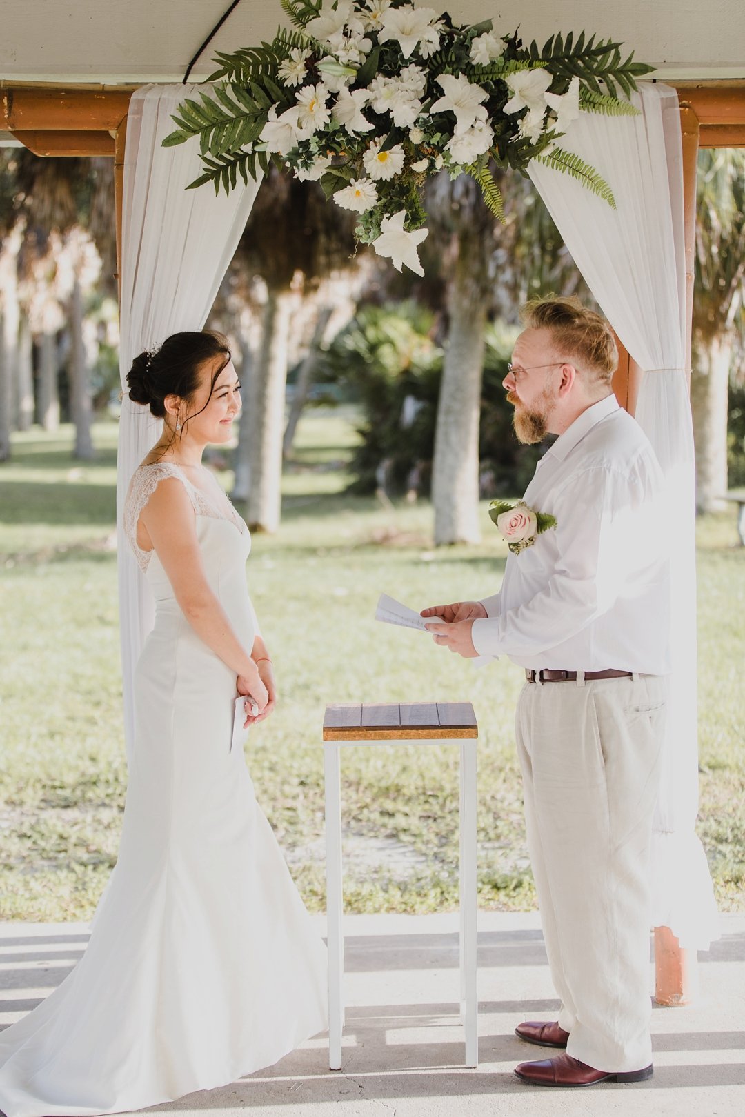 A beautiful couple celebrates their intimate elopement on Honeymoon Island with Saint Petersburg Florida wedding photographer Tami Keehn. 